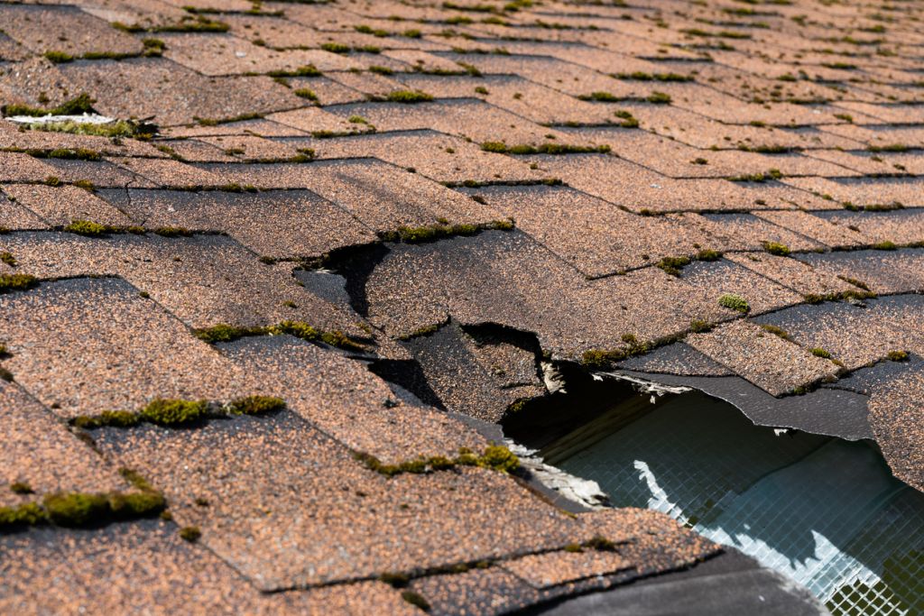 Damaged roof - hole in roof